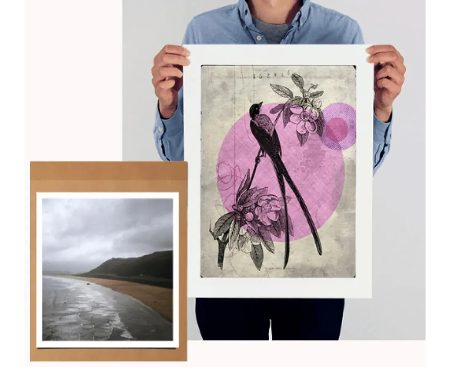 Two photographic art prints being held up